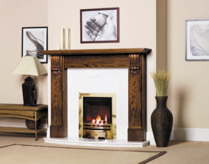 An oak fireplace with a matched pair of large reeded Classical corbels (item code WO656). This fire surround has been stained for a contemporary look.