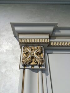 Corner patera applique in gold on a pale grey painted wood frame. This adds to a Georgian style interior.